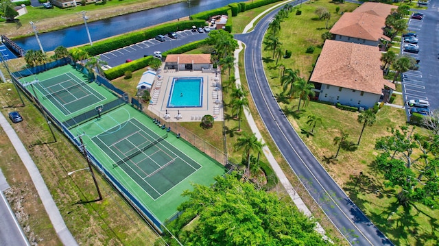 birds eye view of property featuring a water view