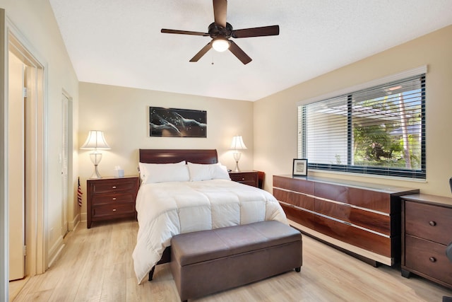 212 Club Dr, Palm Beach Gardens, FL 33418 - bedroom featuring light wood-type flooring, baseboards, and a ceiling fan