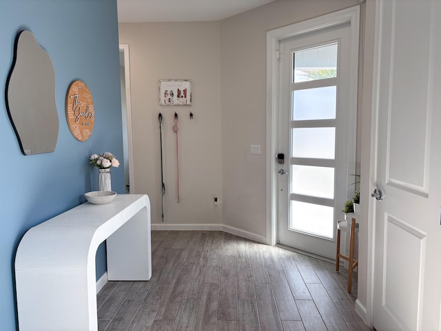 doorway to outside with hardwood / wood-style floors