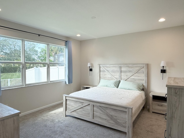 bedroom with light carpet