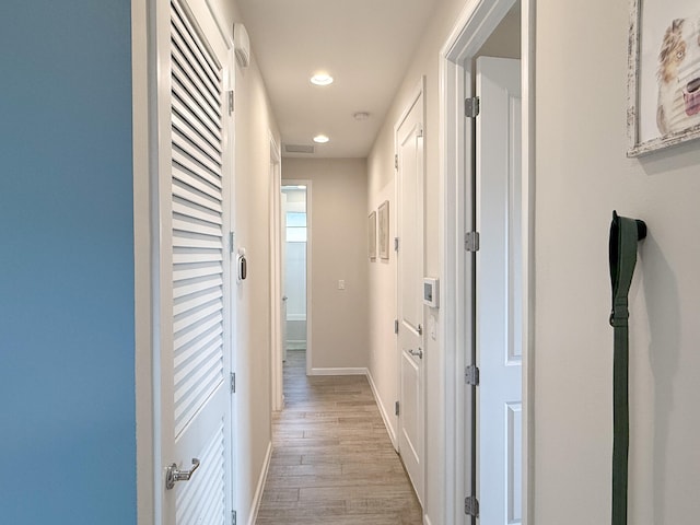 hallway featuring light wood-type flooring