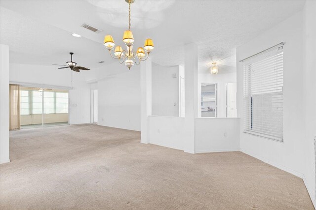 carpeted foyer featuring a textured ceiling