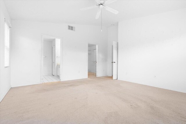 unfurnished living room featuring light hardwood / wood-style flooring and ceiling fan with notable chandelier