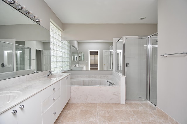 11481 Kanapali Ln, Boynton Beach, FL 33437 - bathroom featuring a stall shower, a bath, double vanity, and tile patterned floors