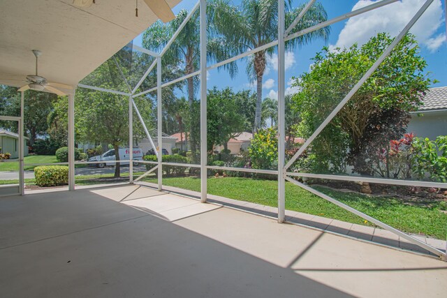 11481 Kanapali Ln, Boynton Beach, FL 33437 - unfurnished sunroom featuring a ceiling fan