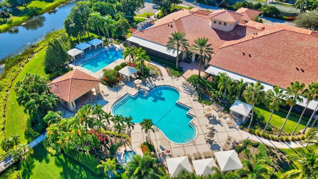 11481 Kanapali Ln, Boynton Beach, FL 33437 - drone / aerial view of a pool area and a nearby body of water