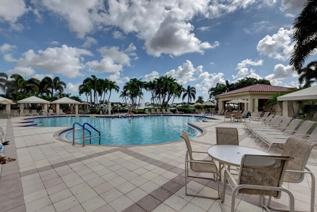 11481 Kanapali Ln, Boynton Beach, FL 33437 - community pool with a gazebo and a patio