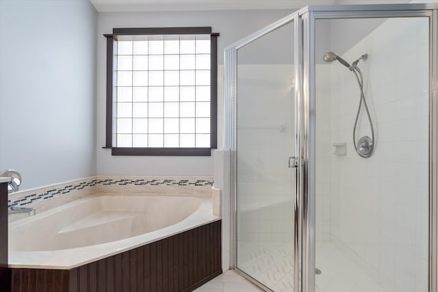 bathroom featuring plus walk in shower