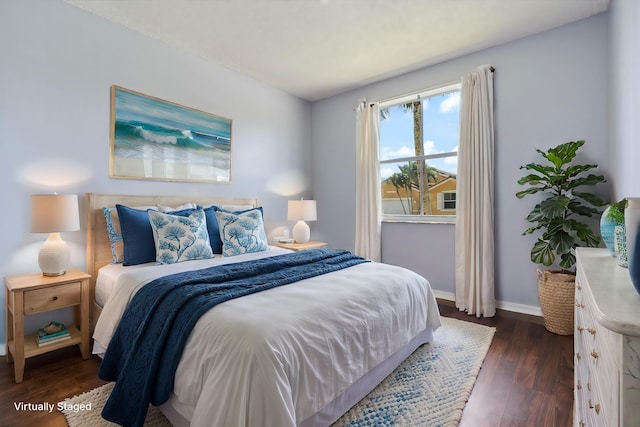 bedroom featuring dark hardwood / wood-style floors