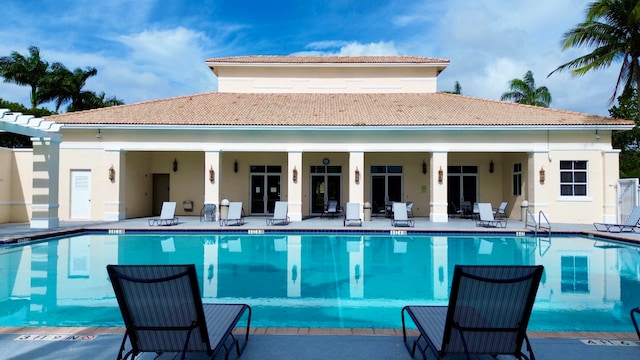 view of swimming pool featuring a patio area