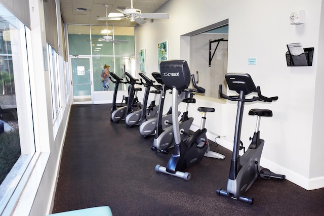 exercise room featuring ceiling fan