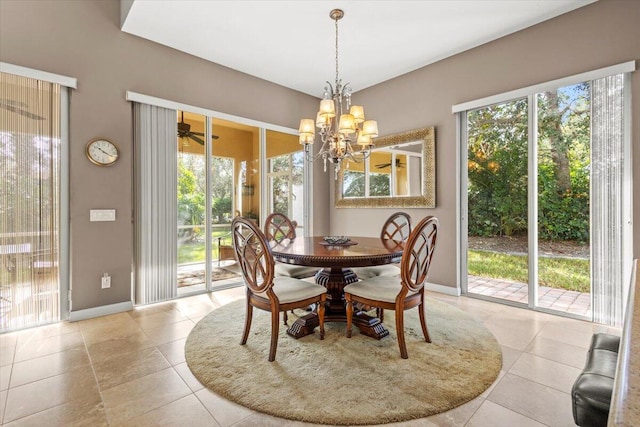 dining room featuring an inviting chandelier and light tile patterned floors