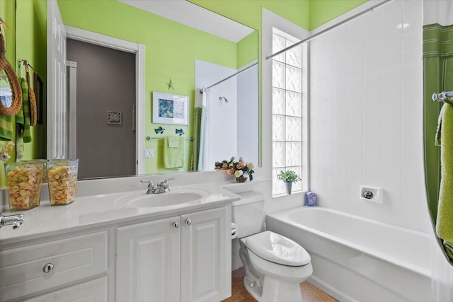 full bathroom with vanity, toilet, tile patterned floors, and shower / bath combination with curtain