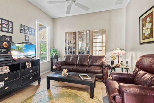 living room with light carpet and ceiling fan