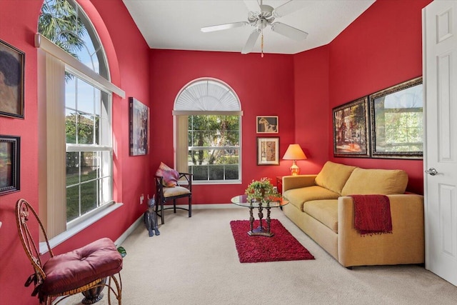 living room with carpet flooring and a healthy amount of sunlight