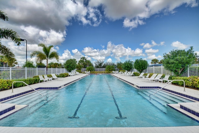 view of swimming pool featuring a patio