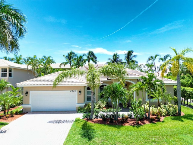 view of front of property with a garage