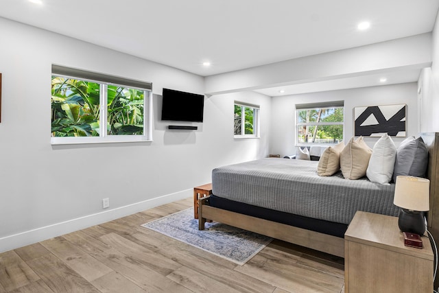 bedroom featuring light hardwood / wood-style flooring