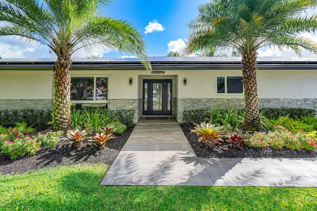 entrance to property with french doors