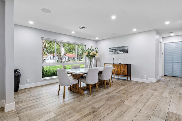 dining space featuring light hardwood / wood-style floors