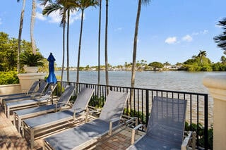 view of patio with a water view