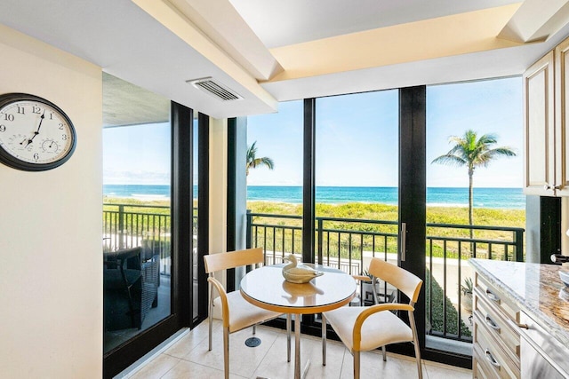1800 S Ocean Blvd Unit 2A, Boca Raton, FL 33432 - sunroom featuring view of water and beach