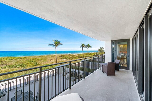 1800 S Ocean Blvd Unit 2A, Boca Raton, FL 33432 - balcony featuring view of water and beach
