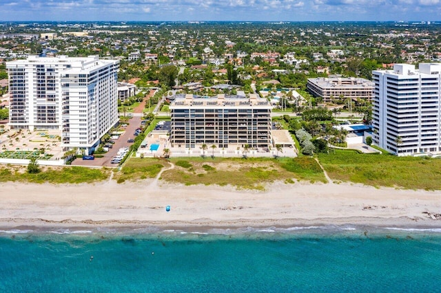 aerial view with a view of the beach and a water view