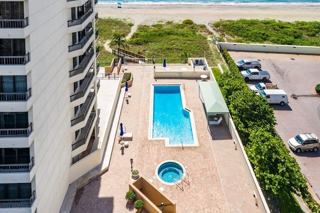 view of swimming pool with a patio area