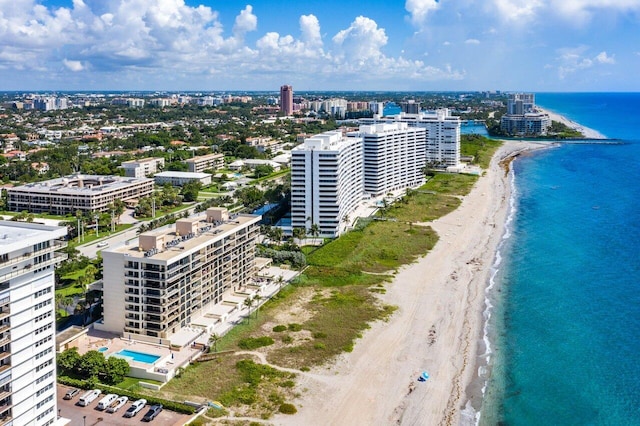 aerial view featuring a water view and a beach view