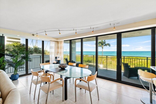 1800 S Ocean Blvd Unit 2A, Boca Raton, FL 33432 - sunroom with a water view and rail lighting