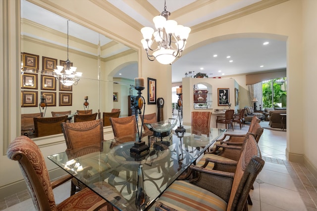 dining area featuring light tile patterned flooring, a chandelier, and ornamental molding