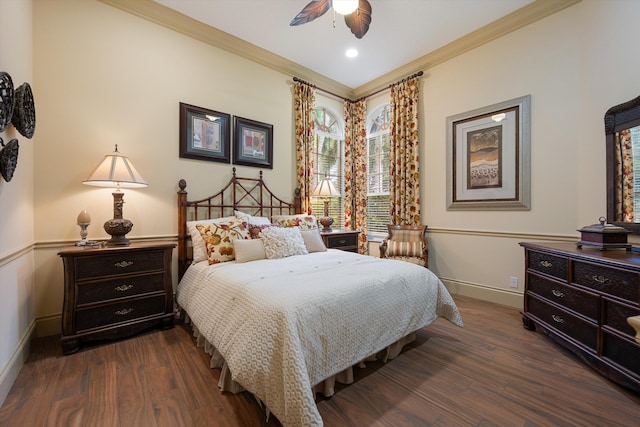 bedroom featuring dark wood-type flooring, ceiling fan, and crown molding