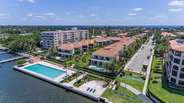 drone / aerial view with a water view