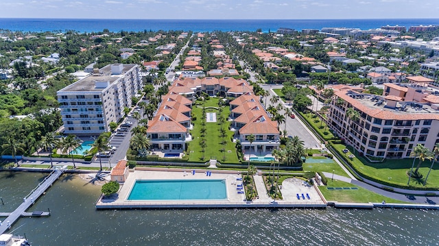 birds eye view of property featuring a water view