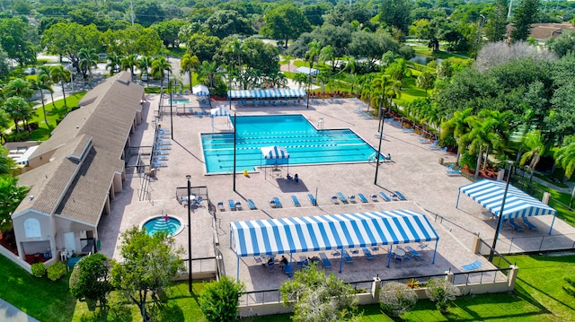 view of swimming pool with a patio area