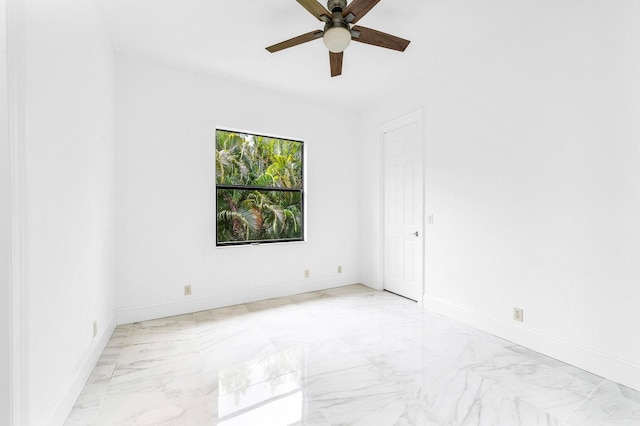 spare room with ceiling fan