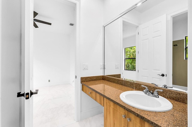 bathroom with vanity and ceiling fan