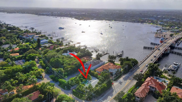 birds eye view of property featuring a water view