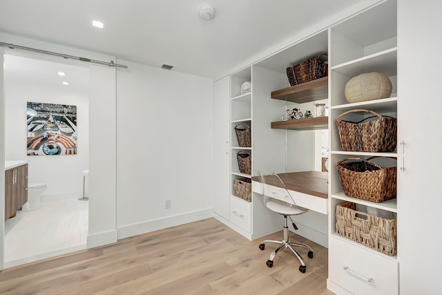 office area featuring light hardwood / wood-style floors