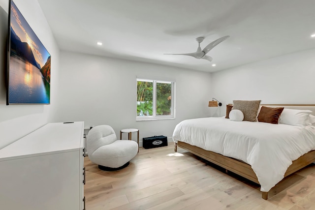 bedroom featuring light hardwood / wood-style floors and ceiling fan