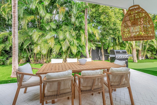 view of patio with an outdoor hangout area and grilling area