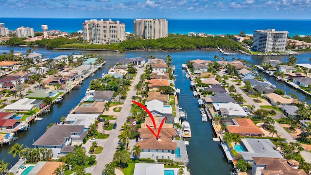 birds eye view of property featuring a water view