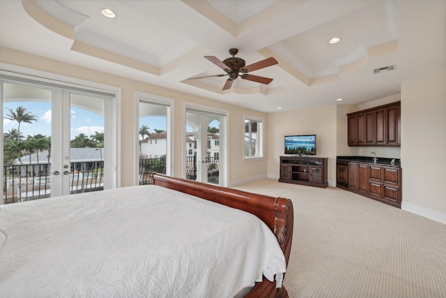 bedroom featuring french doors, light carpet, ceiling fan, and access to exterior