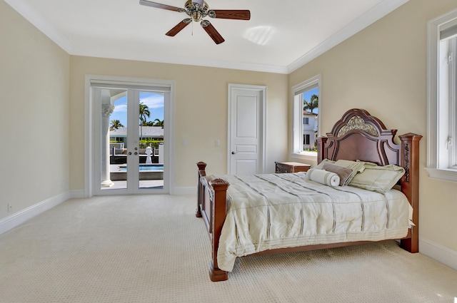 bedroom with french doors, light colored carpet, access to exterior, ornamental molding, and ceiling fan