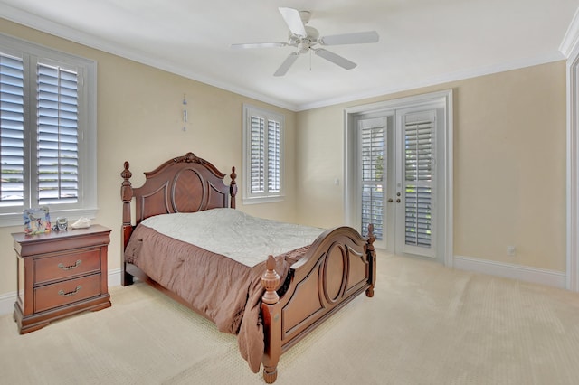 carpeted bedroom featuring ornamental molding, access to outside, and ceiling fan