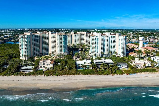 aerial view featuring a water view and a beach view