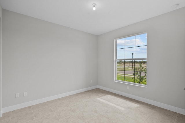 view of tiled spare room