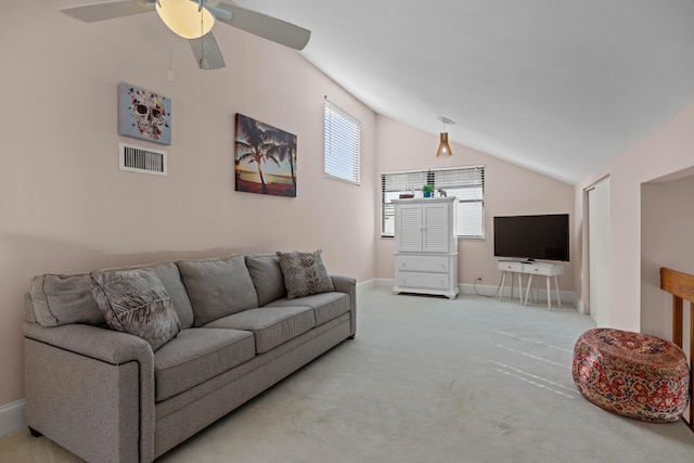 carpeted living room featuring lofted ceiling and ceiling fan