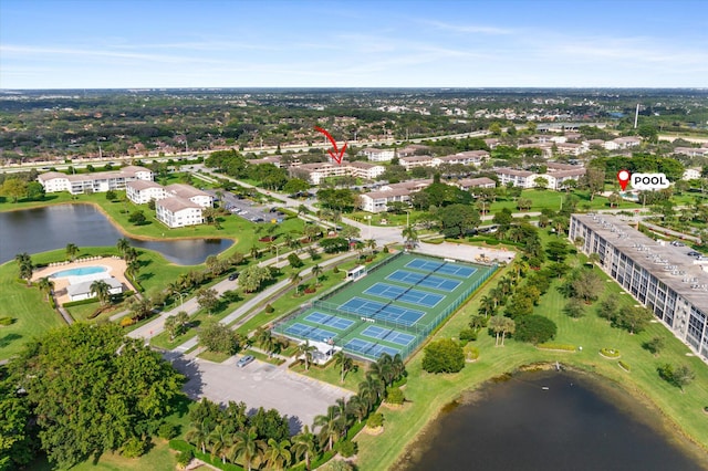 birds eye view of property featuring a water view